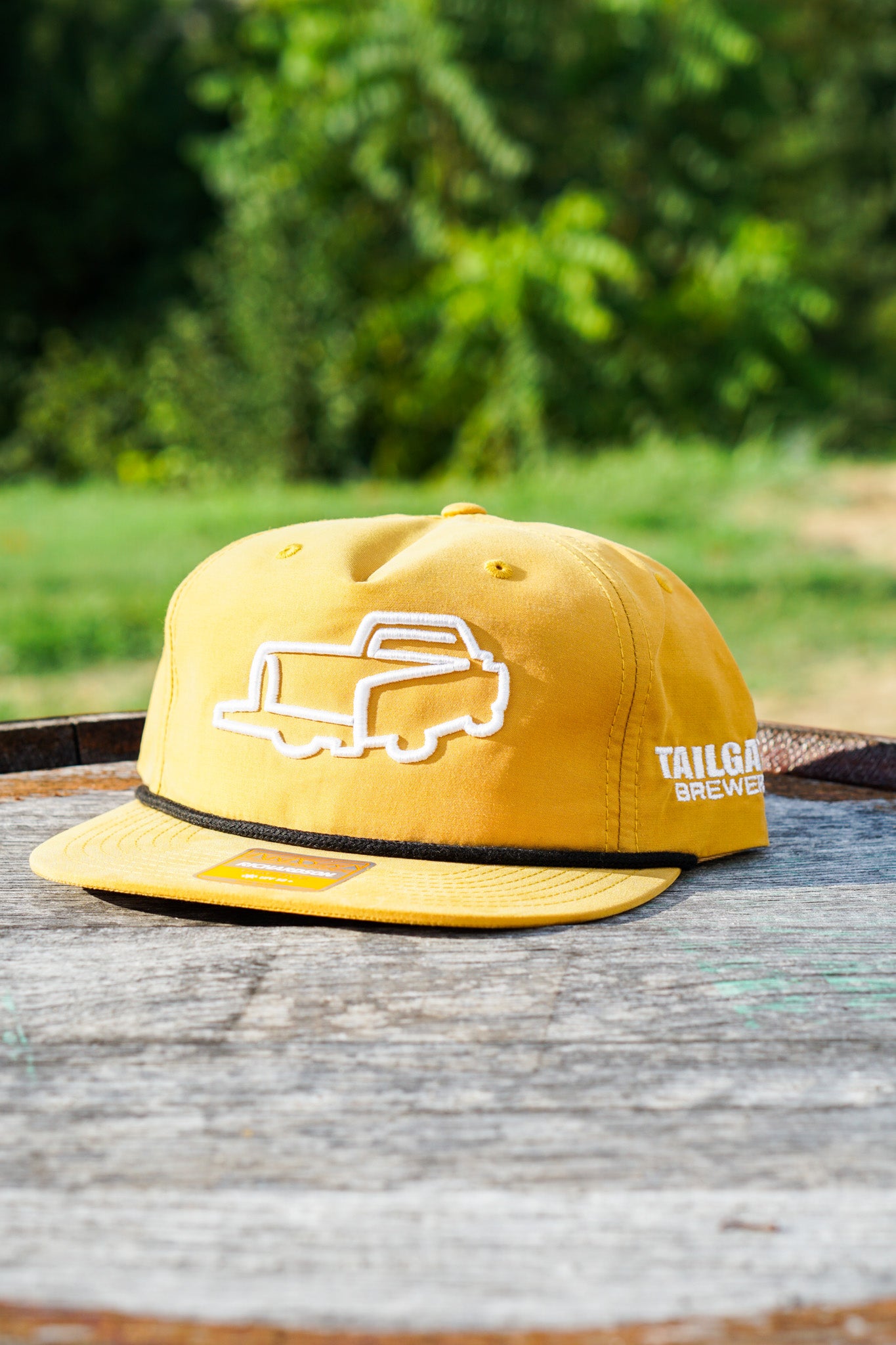 Logo Trucker Hat in Biscuit with Black Rope